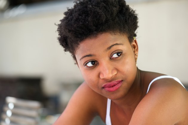 Young african american woman looking away