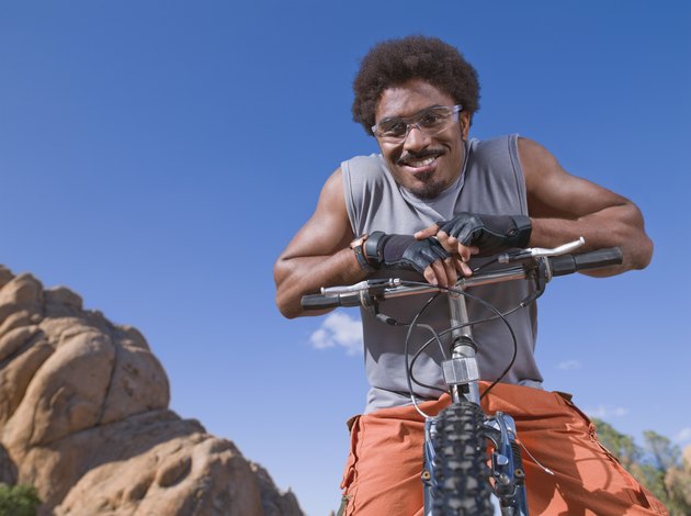 African man on mountain bike