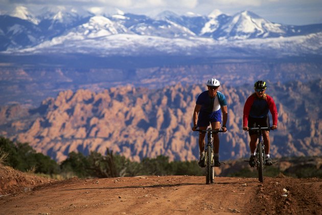 Couple mountain-biking