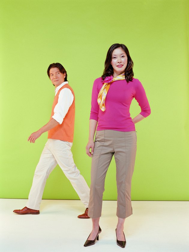 Man walking, looking at woman, portrait