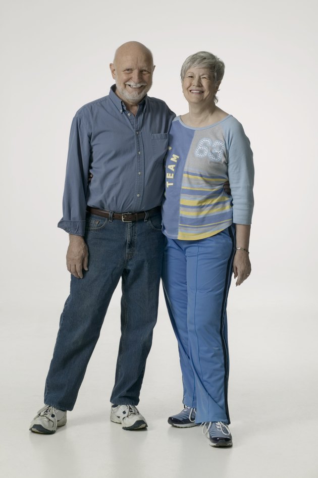 Senior couple, posing in studio, portrait