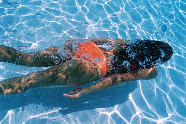 Woman swimming underwater