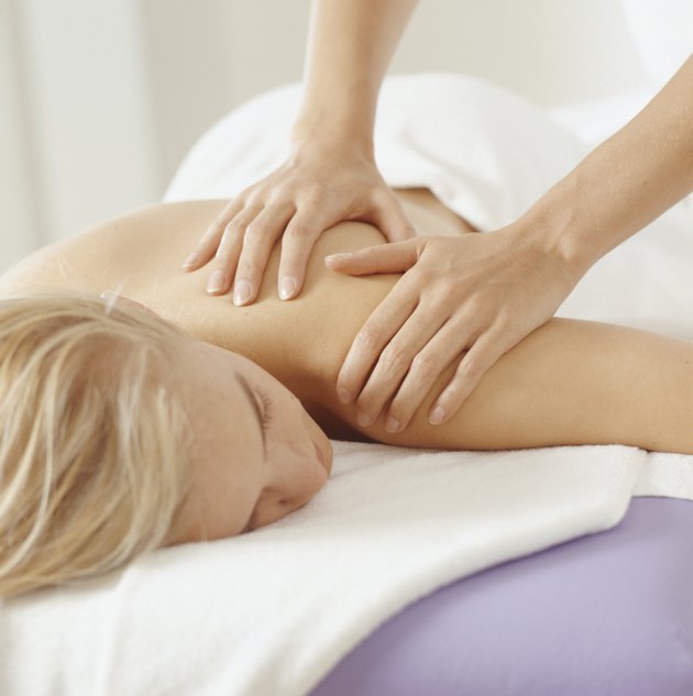 Young woman having massage, close-up