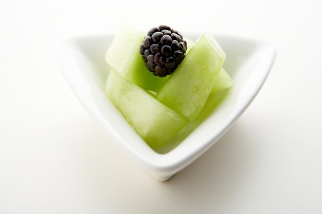 Blackberry on slices of honeydew