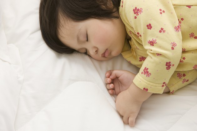 Mixed race girl sleeping