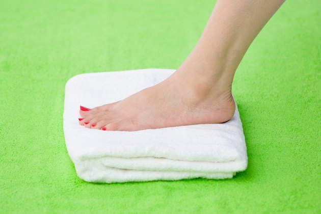 Feet over towel