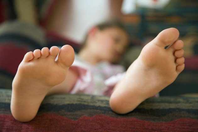 Girl lying on sofa