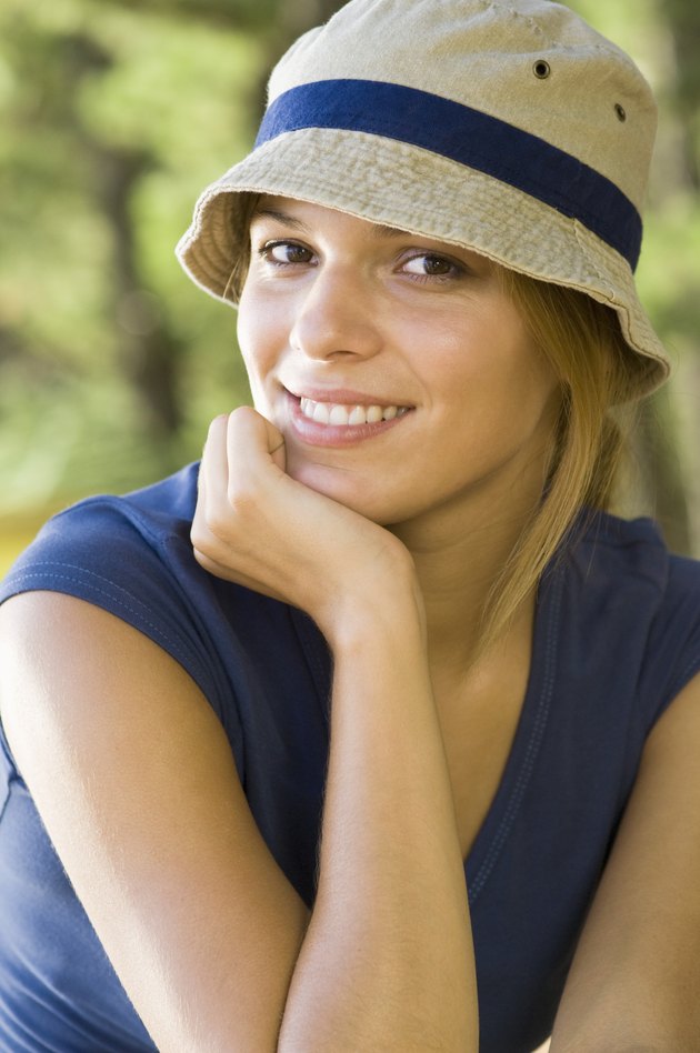 Smiling woman with hat