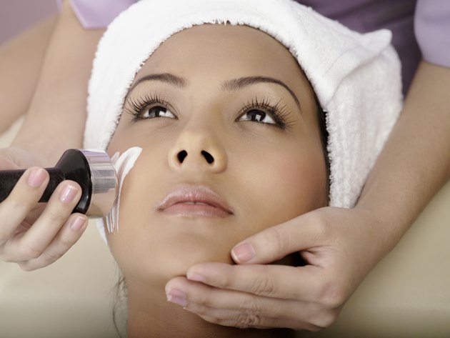 Woman having microdermabrasion
