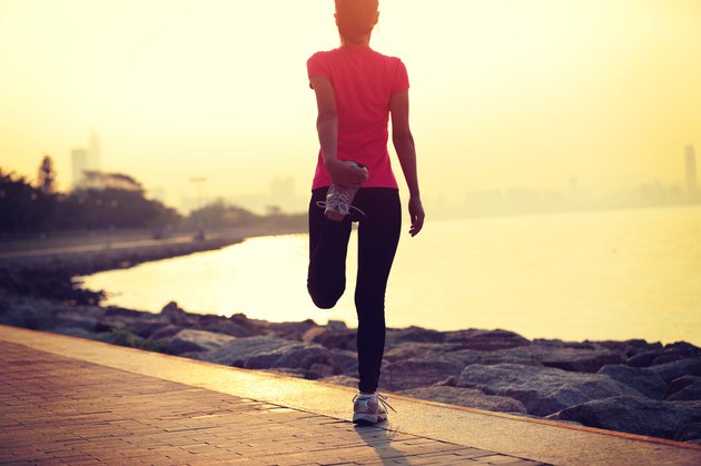 healthy lifestyle beautiful asian woman stretching legs