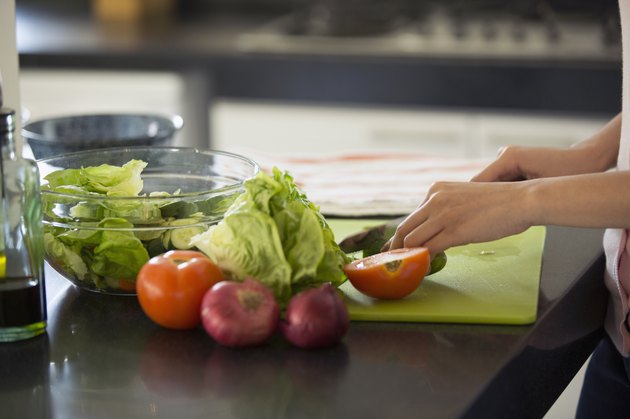 Cropped image of woman making a healthy meal