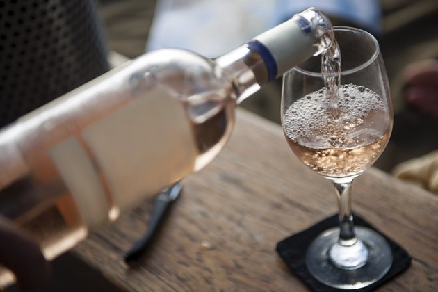 White wine pouring into glass