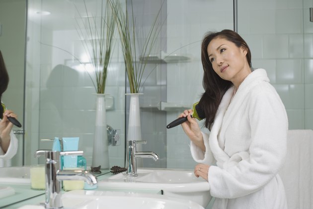 Woman brushing her hair