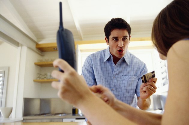 Couple arguing over credit card