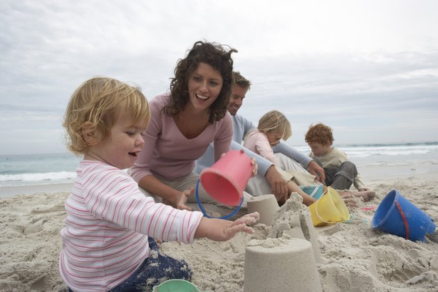 Family playing at beach