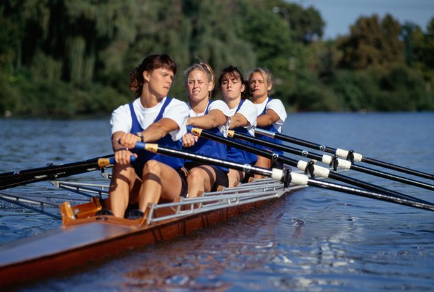 Crew team rowing