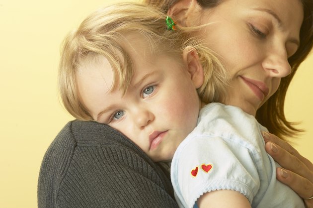 Mother consoling sad daughter