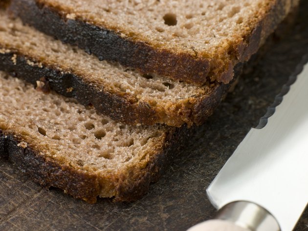 Slices of Rye Bread on a Chopping Board