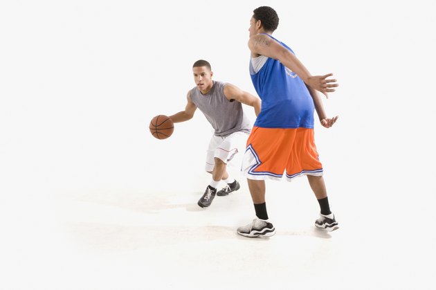 Men playing basketball