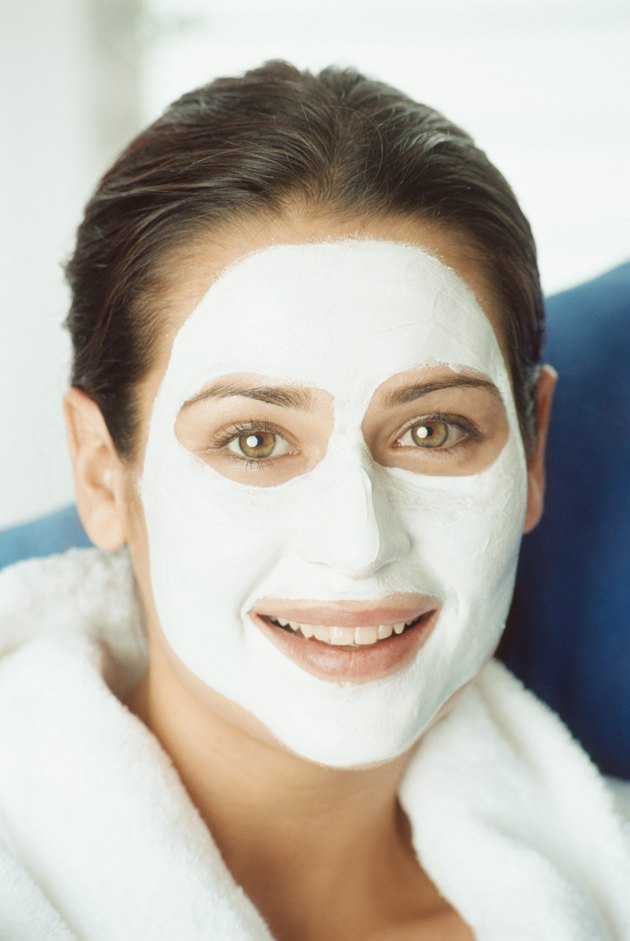 Portrait of woman wearing a cosmetic face mask
