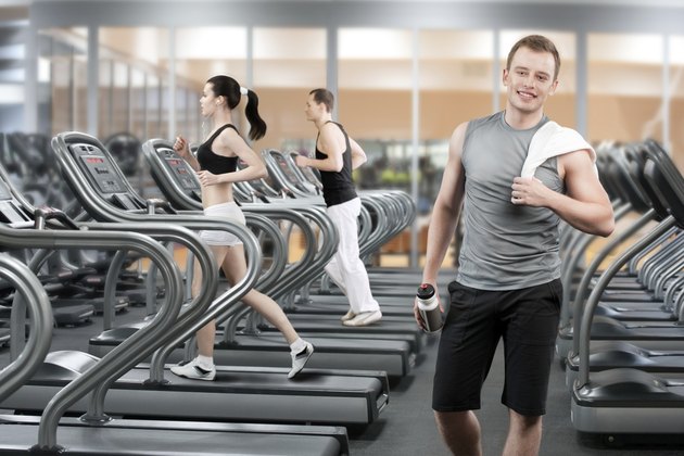 Young man in fitness club