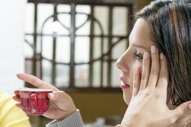 Long hair woman is shown tired
