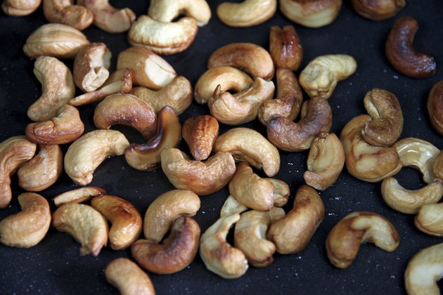 Roasted cashews in the pan.