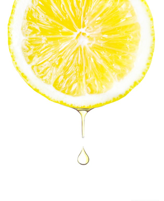 Sliced lemon with juice dropping. Isolated on white