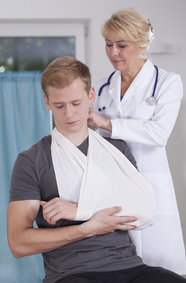 Man with a sling on hand