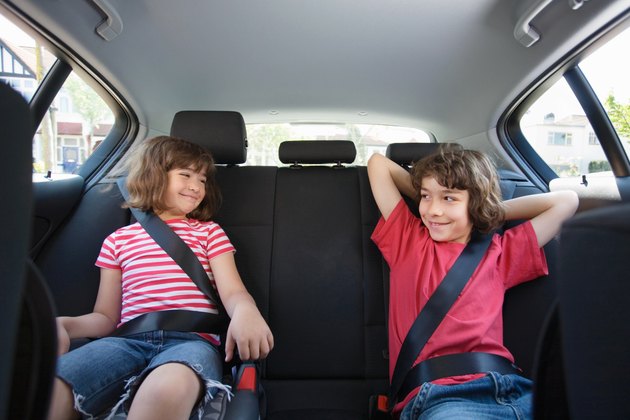 Children sat in a car