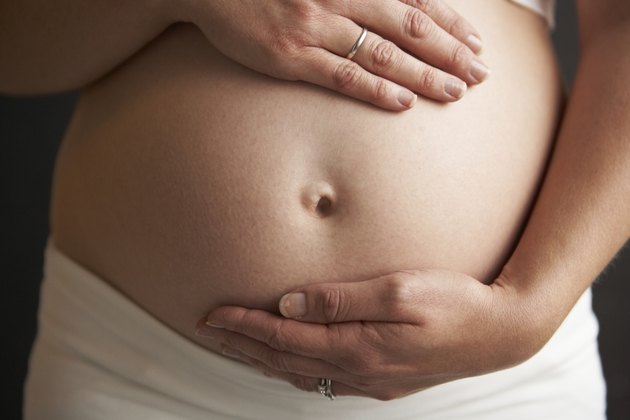 Close Up Portrait Of 5 months Pregnant Woman