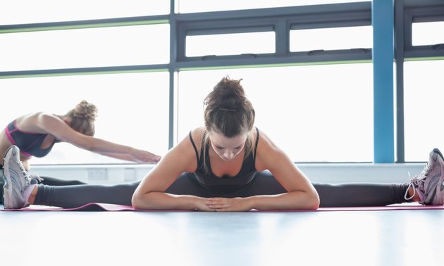 Woman stretching her legs