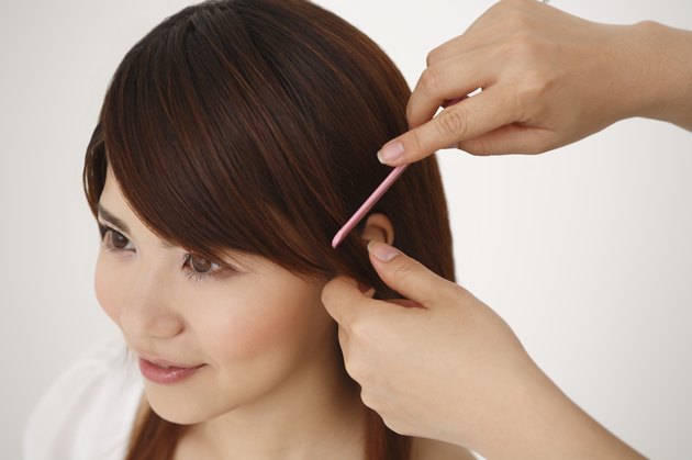 Young Woman Having Hair Set