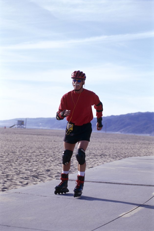 Senior man in-line skating