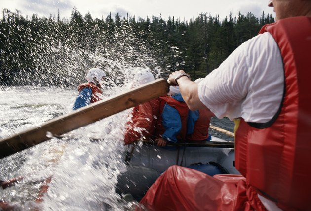Group of people in canoe, close-up