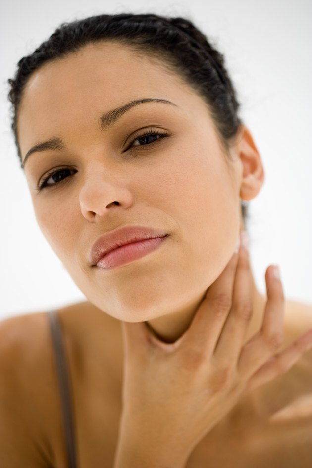 Woman feeling glands
