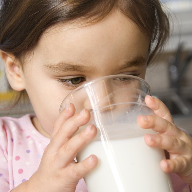 Girl drinking milk.