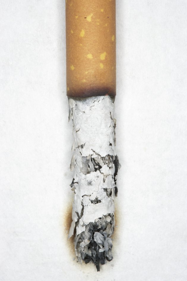 Burning cigarette, overhead view, close-up