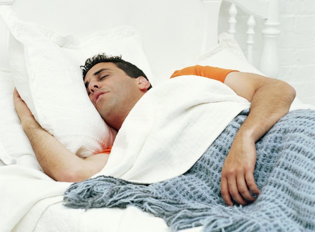 Man sleeping in bed