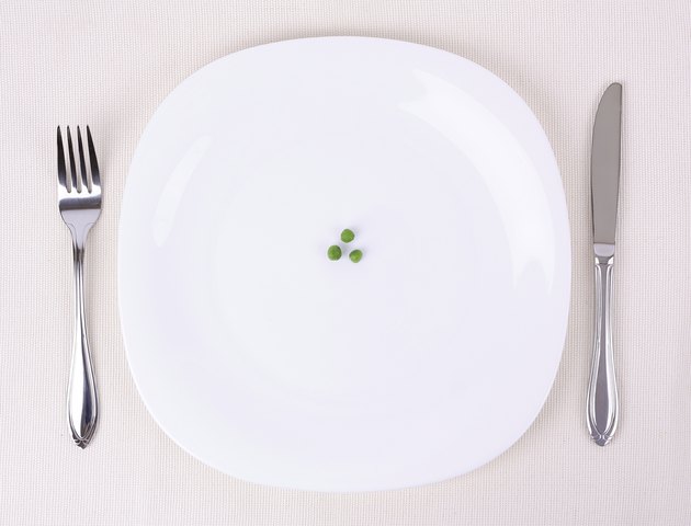 Small portion of food on a big plate