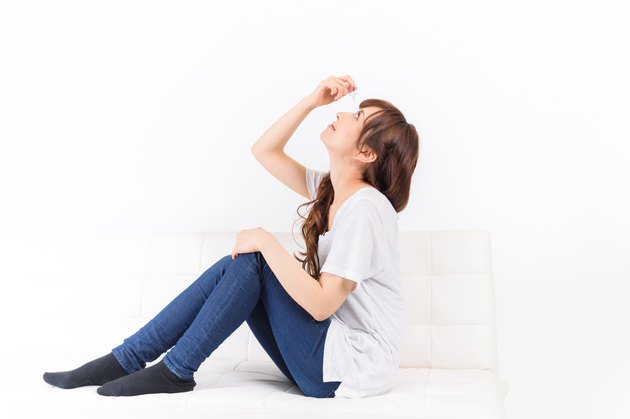 japanese young woman put in the eye drops