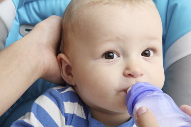 baby drinks milk