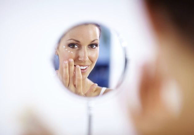 Giving thought to the health of her skin