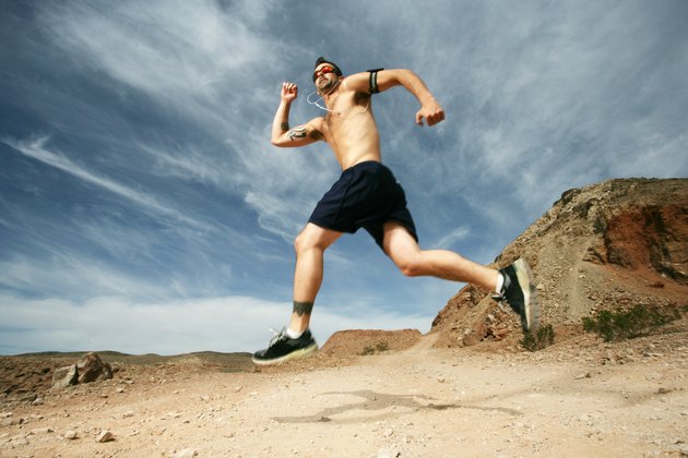 Caucasian man in shorts running