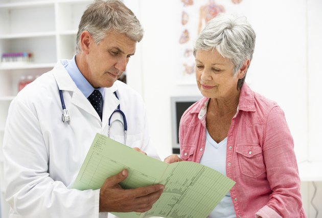 Doctor with senior female patient