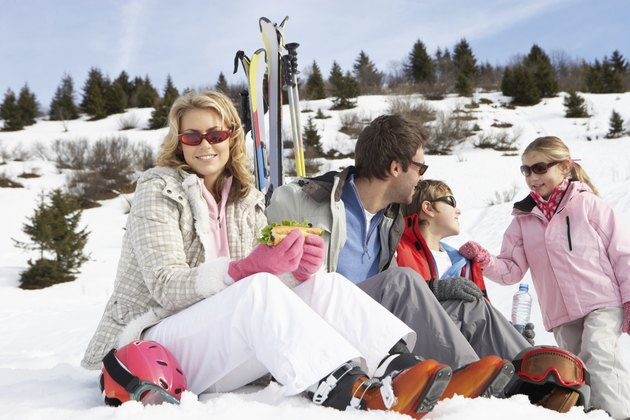 Young Family On Ski Vacation