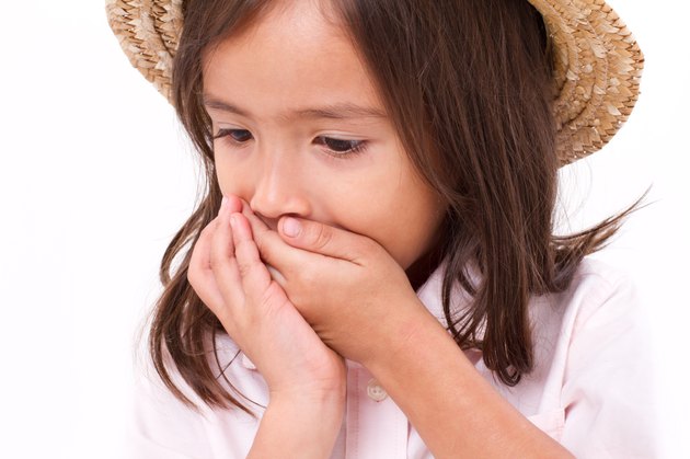 sick girl with nausea or indigestion symptom