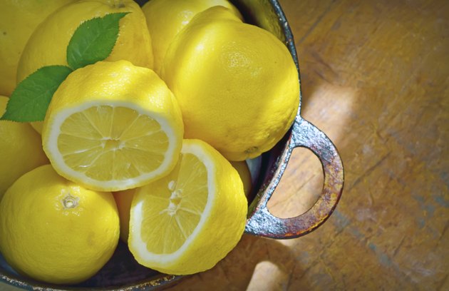 fresh lemons on a wood table