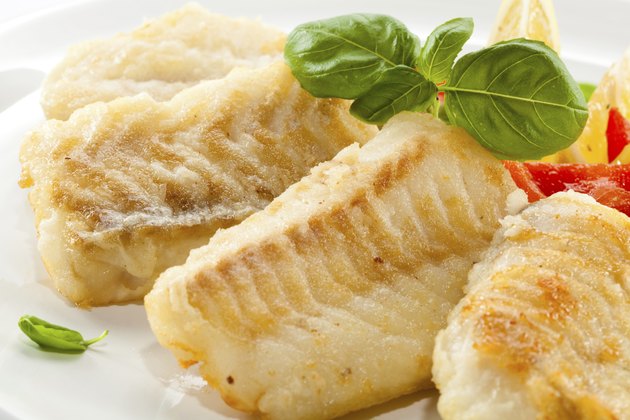 Fried cod fillets and vegetables