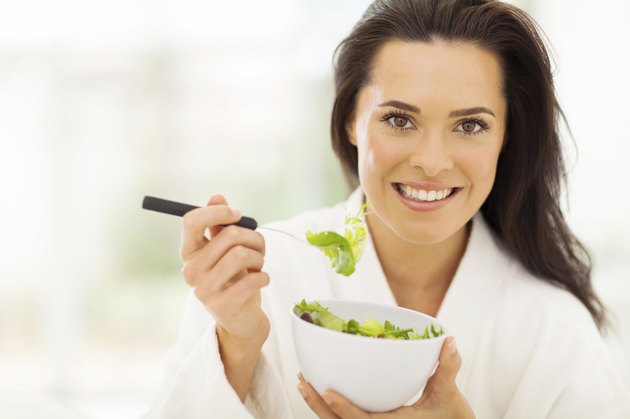 young woman eating healthy food